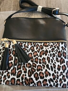 New Zanana Leopard Print Crossbody Bag with Black Trim.